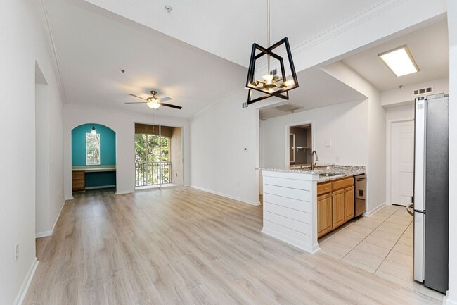 Building Photo - IMMACULATE 2nd Story condominium with so m...