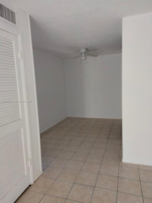 Building Photo - 10886 Royal Palm Blvd