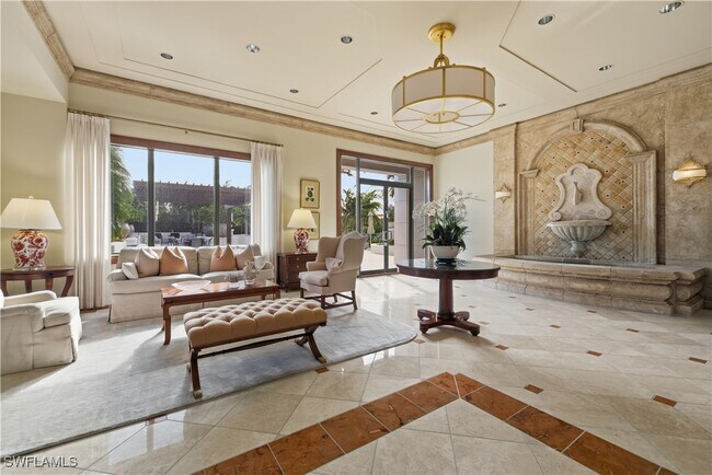 Building Photo - 8990 Bay Colony Dr