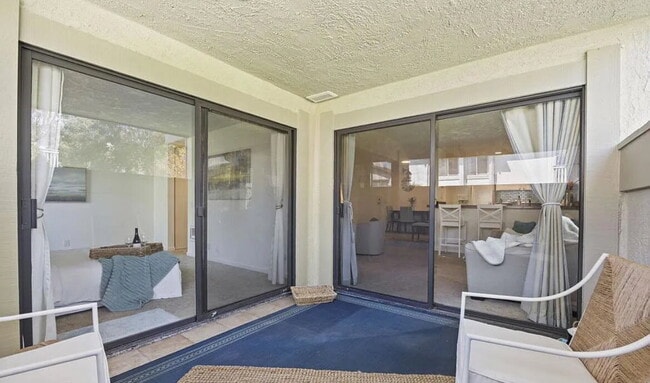 Building Photo - charming one-bedroom, one-bath retreat nestled in a serene beachside community