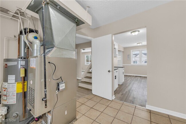 Building Photo - 7611 Newport Ave