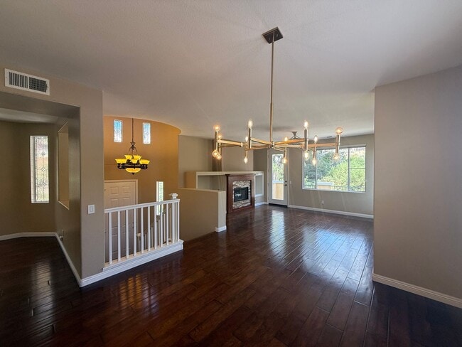 Building Photo - Spacious 3BR/2.5BA Home with Gated Communi...