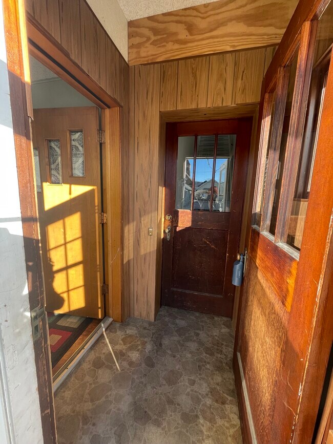 Left Door goes to Advertised Unit - 556 E 5th St