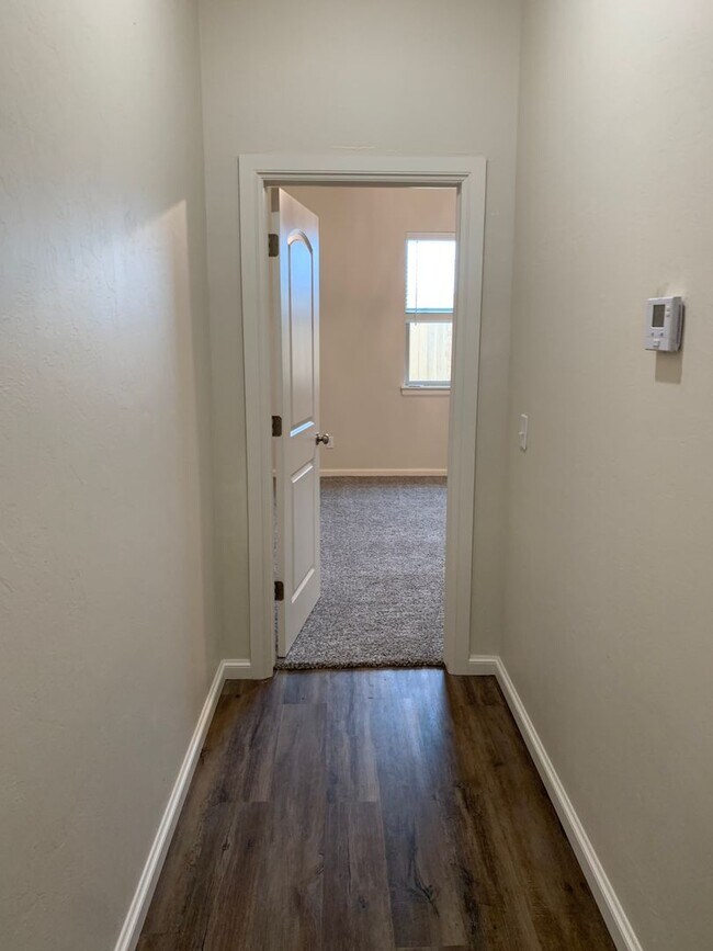 Building Photo - 3 bedroom, 3 bathroom, 2 car garage with a study in Gated Neighborhood