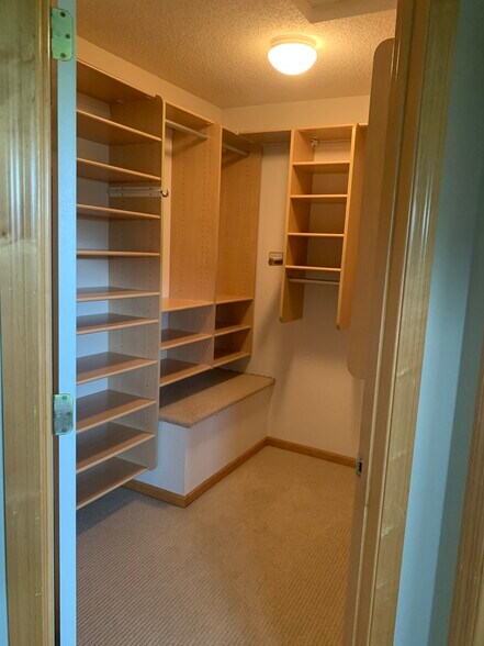 Primary closet upgraded with California Closets. - 1530 Zarthan Avenue South