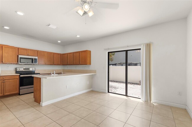 Building Photo - 9314 W 33rd Ln