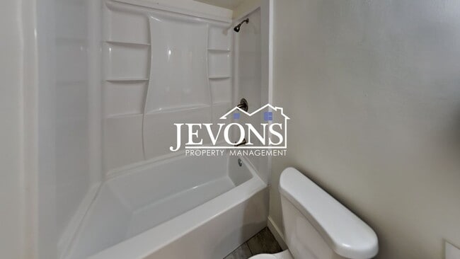 Building Photo - Step into your new residence, a charming s...