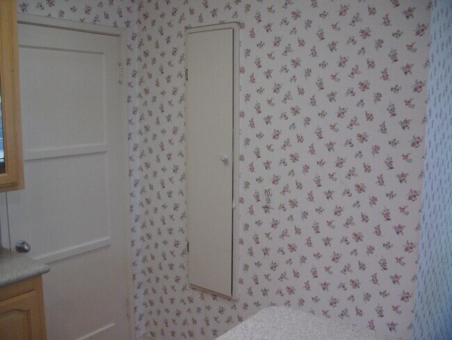 Built-In ironing board - 3121 W Wyoming Ave