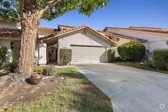 Building Photo - Upgraded La Costa Townhome