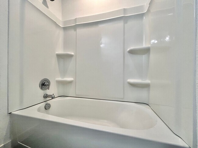 Building Photo - Inviting 4-Bed, 2.5-Bath Home with High Ceilings and Covered Deck