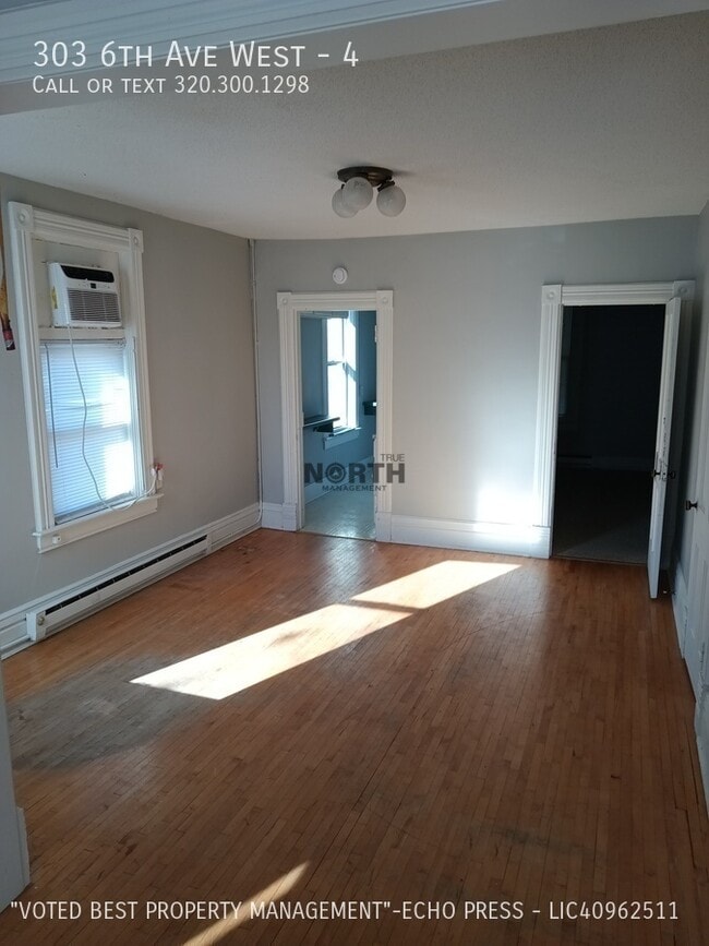 Building Photo - 303 6th Ave W