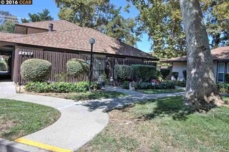 Building Photo - Stylish & Sun-Filled Condo with Private Patio in Prime Concord Location