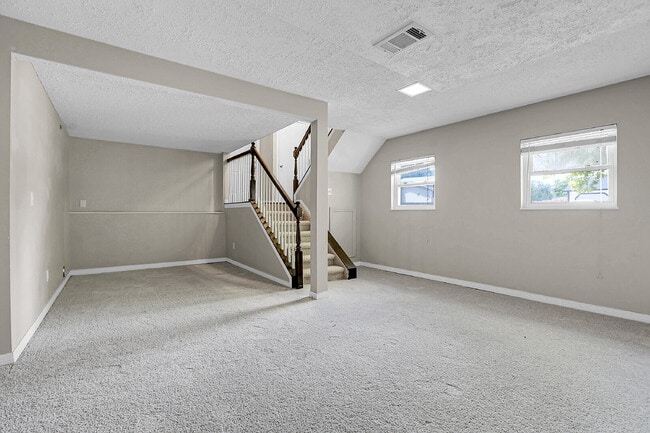 Building Photo - $2,720.95 - 4 bed, 2 bath, located in Aurora with attached Garage and In Unit Washer and Dryer!