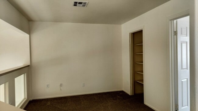 Building Photo - Townhome with Loft + Two Bedrooms/Baths - Designed for Comfort in Gated Community