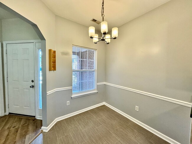 Building Photo - Ready NOW!! A 3-Bedroom Townhome w/Attache...