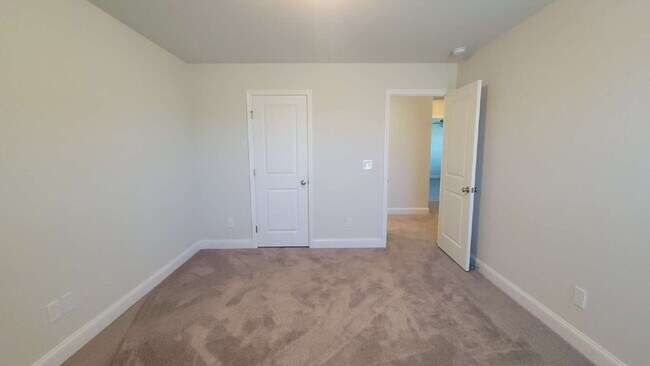 Building Photo - Coming Soon!!!  "Spacious 4-Bedroom Retrea...