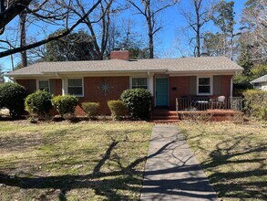 Building Photo - Mature Neighborhood, Modern Conveniences