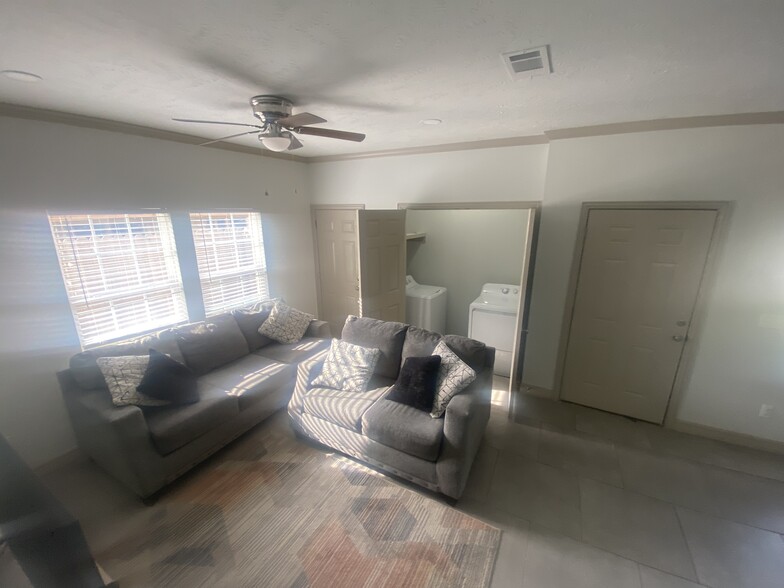 Living area with washer and dryer - 2925 Pecos St