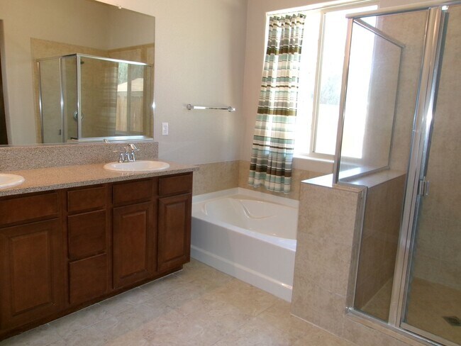 Building Photo - Spacious home located in gated community.