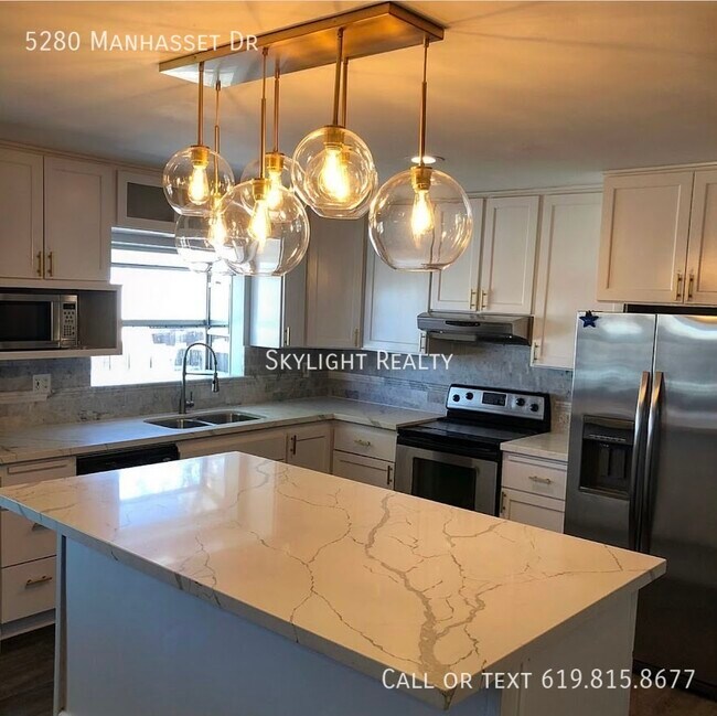 Building Photo - 5280 Manhasset Dr