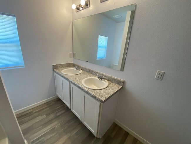 Building Photo - Four Bedroom / Three Bath Home