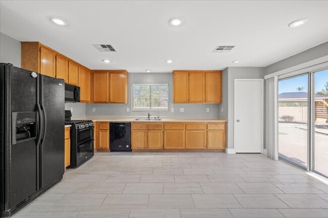 Building Photo - Stylish 4 Bedroom Living Meets Outdoor Fun