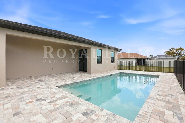 Building Photo - 3BR/2BA New Construction with Pool, Paver Driveway, Designer Finishes & Garage - Cape Coral!
