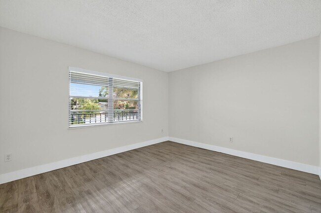 Building Photo - Outstanding one-bedroom, one-bath property with water views and upgrades.