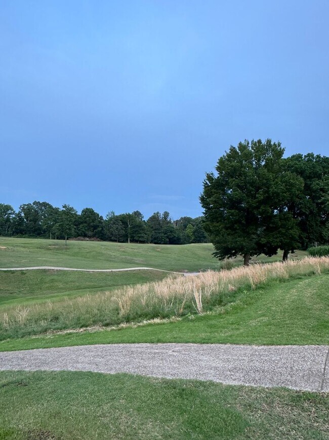 Building Photo - Steps from the Tee—Your Golf Course Home A...