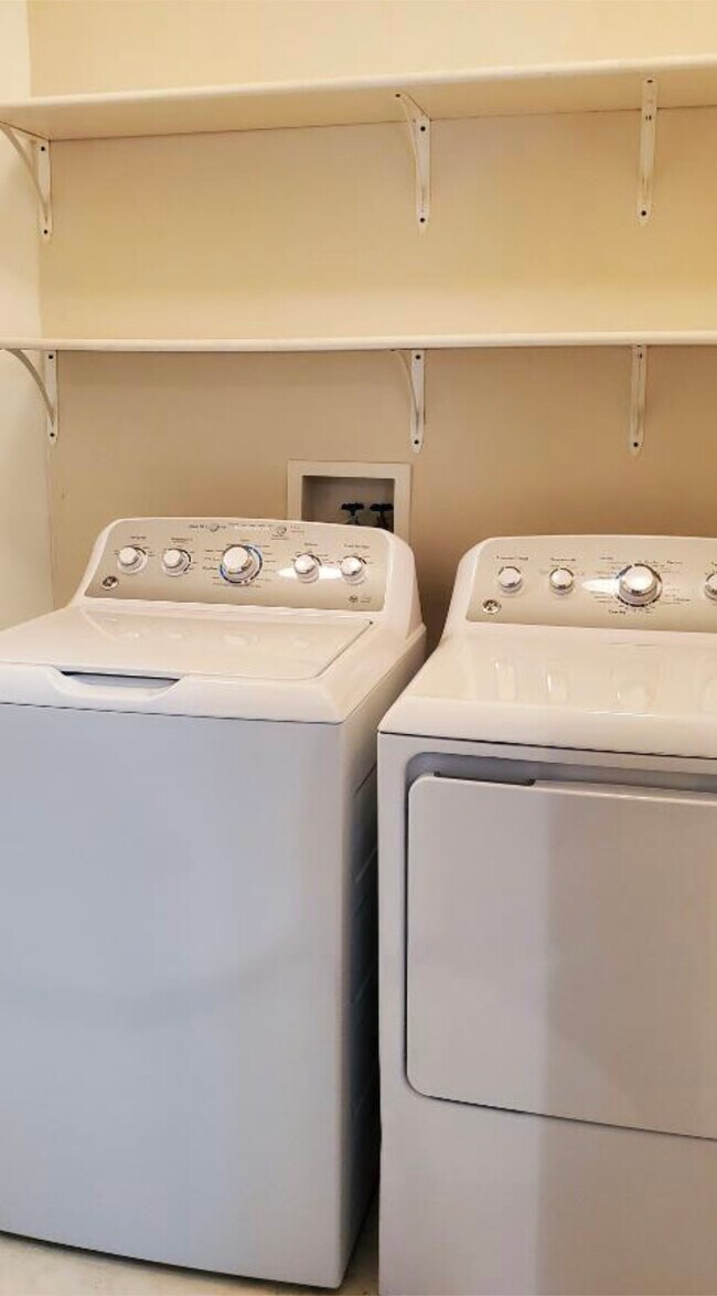 Brand new washing machine and dryer on main floor - 6205 Cross Bend Ct