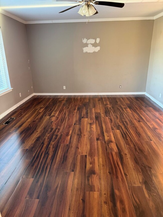 Building Photo - 2 story house for lease. Open floor plan in kitchen & living. Lots of storage. Large fenced backy...