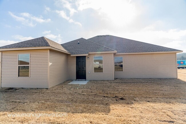 Building Photo - Cozy 4 Bedroom Elkins Home! Lots of upgrades!!