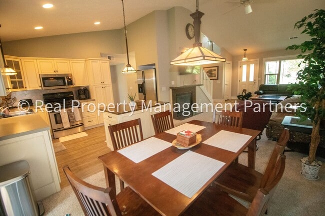 Building Photo - Spacious 3BR Townhome in Lowell | Nature Views & Maintenance-Free Living