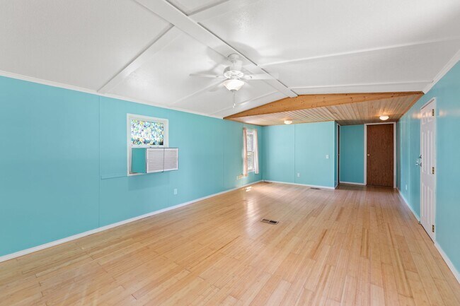 Building Photo - Updated mobile home on acre lot with garag...