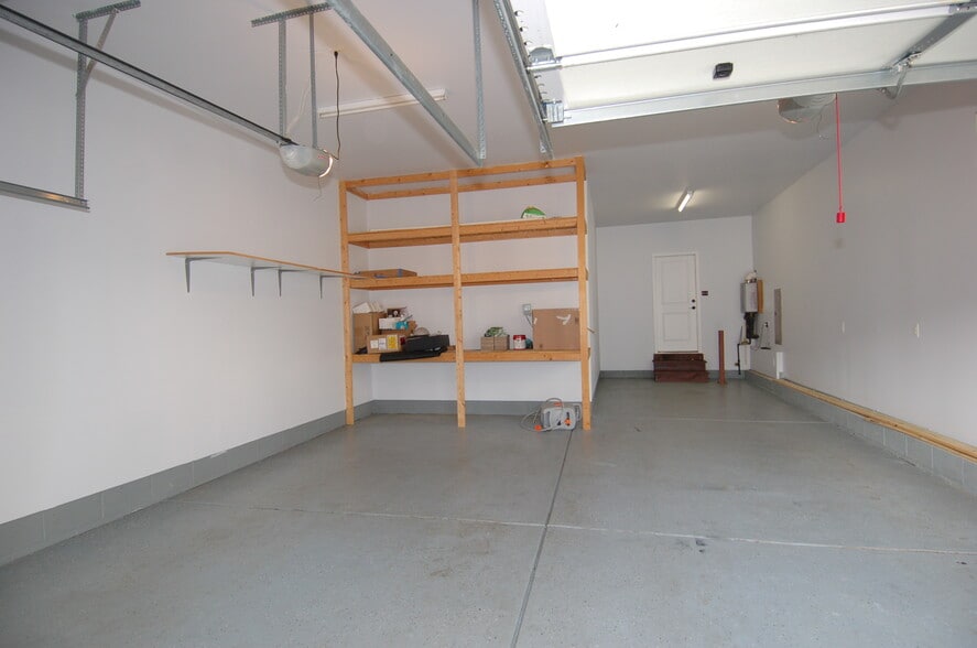 Garage Shelving and EV charger - 4832 Millens Bay Ct