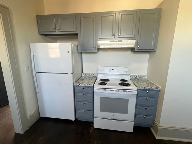 Building Photo - Spacious 4-Bedroom, 2-Bath Home with Porches & Basement