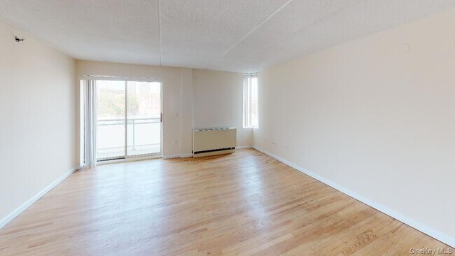 Building Photo - 102-30 Queens Blvd