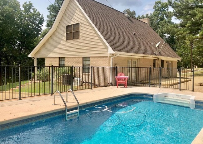 Building Photo - Hilltop Living with a Pool, Loft & Spacious Backyard