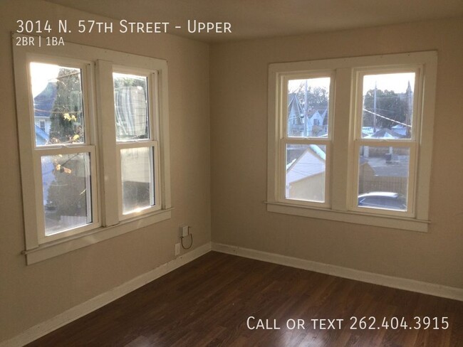 Building Photo - Three Bedroom Spacious Upper Duplex