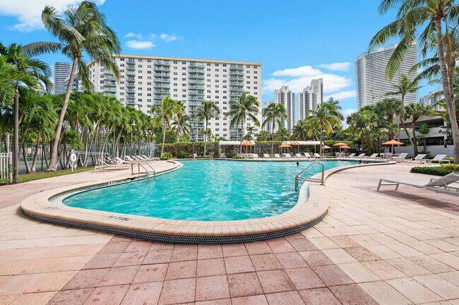 Building Photo - 19380 Collins Ave