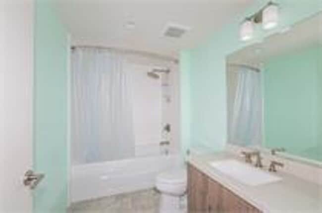 Building Photo - Live in the Heart of Kailua Town in this rarely available end unit!