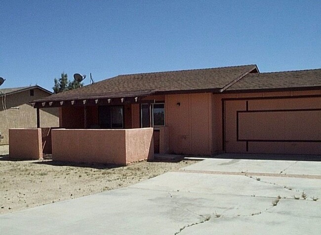 Building Photo - 2 bedroom 2 bath with 2 car attached garage