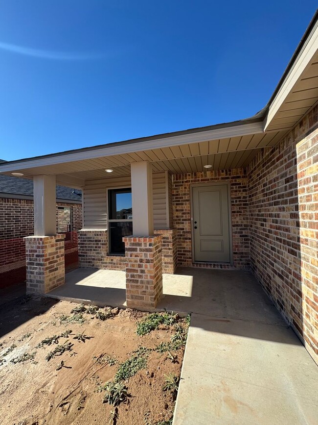 Building Photo - Brand New Construction 3/2/2  1/2 off spec...