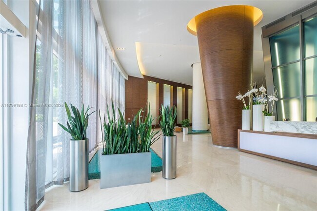 Building Photo - 18201 Collins Ave