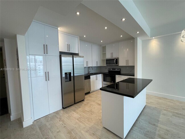 Building Photo - 19390 Collins Ave