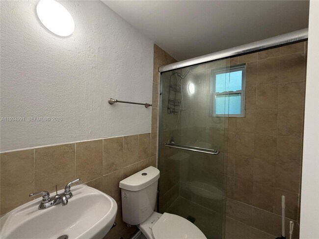 Building Photo - 7928 Harding Ave