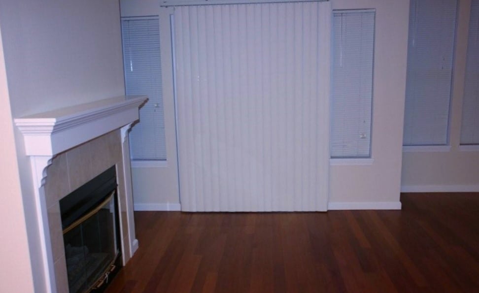 Family room with sliding door leading to small patio - 2680 139th Ave SE