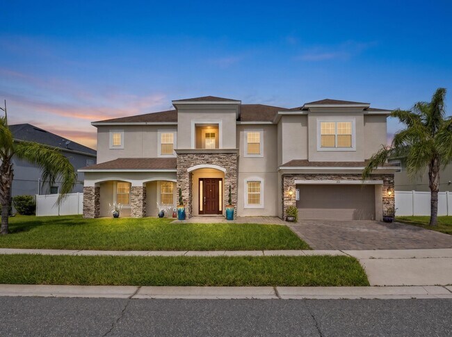 Building Photo - Spacious 6-Bedroom Home Near Lake Nona | 3-Car Garage + Tesla Charger