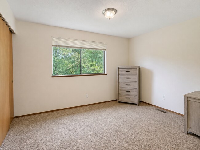 Building Photo - Beautiful Split-Level Home with Fireplace, Deck, Garage, and EV Charger