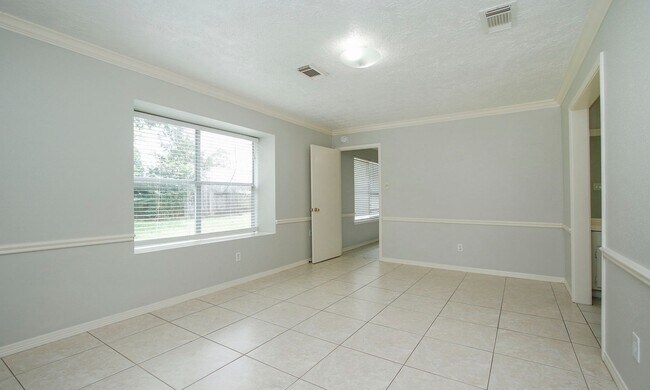 Building Photo - 4 Bedroom 2 Bathroom Cypress Home with Fireplace and Fenced Backyard